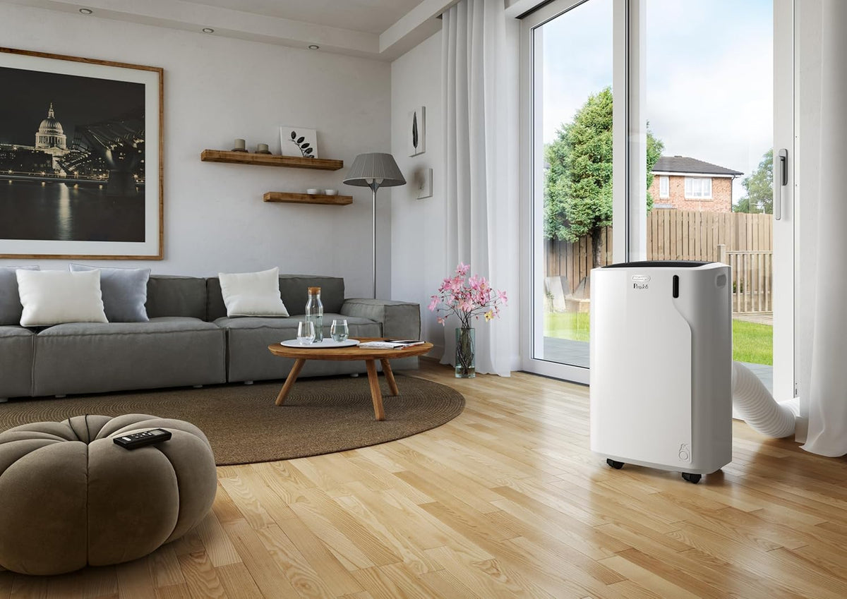De'Longhi Pinguino PAC EL112 CST WiFi, przenośna klimatyzacja z technologią MyEcoRealFeel do pomieszczeń o kubaturze do 110 m³, 11 000 BTU/h, 2,9 kW, 63 dB, funkcja osuszania, A, sterowanie aplikacją i głosem, kolor biały